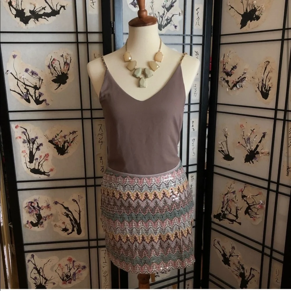 Outfit: T-shirt and skirt! Maroon T-shirt by MADEWELL and multicolored skirt